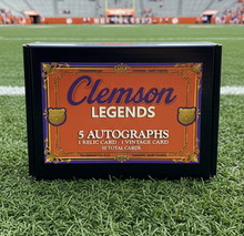 Load image into Gallery viewer, ClemsonBox.com Christmas Gift #1 2025 - Clemson Tigers football cards featuring Cade Klubnik, Dabo Swinney, Phil Mafah, Antonio Williams, Trevor Lawrence, Deshaun Watson, Travis Etienne, DeAndre Hopkins, Sammy Watkins, C.J. Spiller, Tee Higgins, Danny Ford, Hunter Renfrow, Brian Dawkins, Christian Wilkins, Vic Beasley, and many more Clemson legends possible pulls in the GAHLAY! Clemson Tigers Legends Mystery Box
