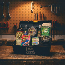 Load image into Gallery viewer, Gahlay beard care products in a black box with tools on a pegboard wall in the background.